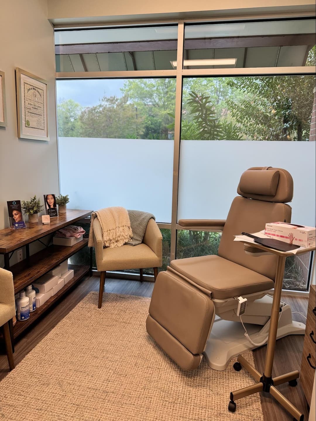 Treatment room with a reclining treatment chair